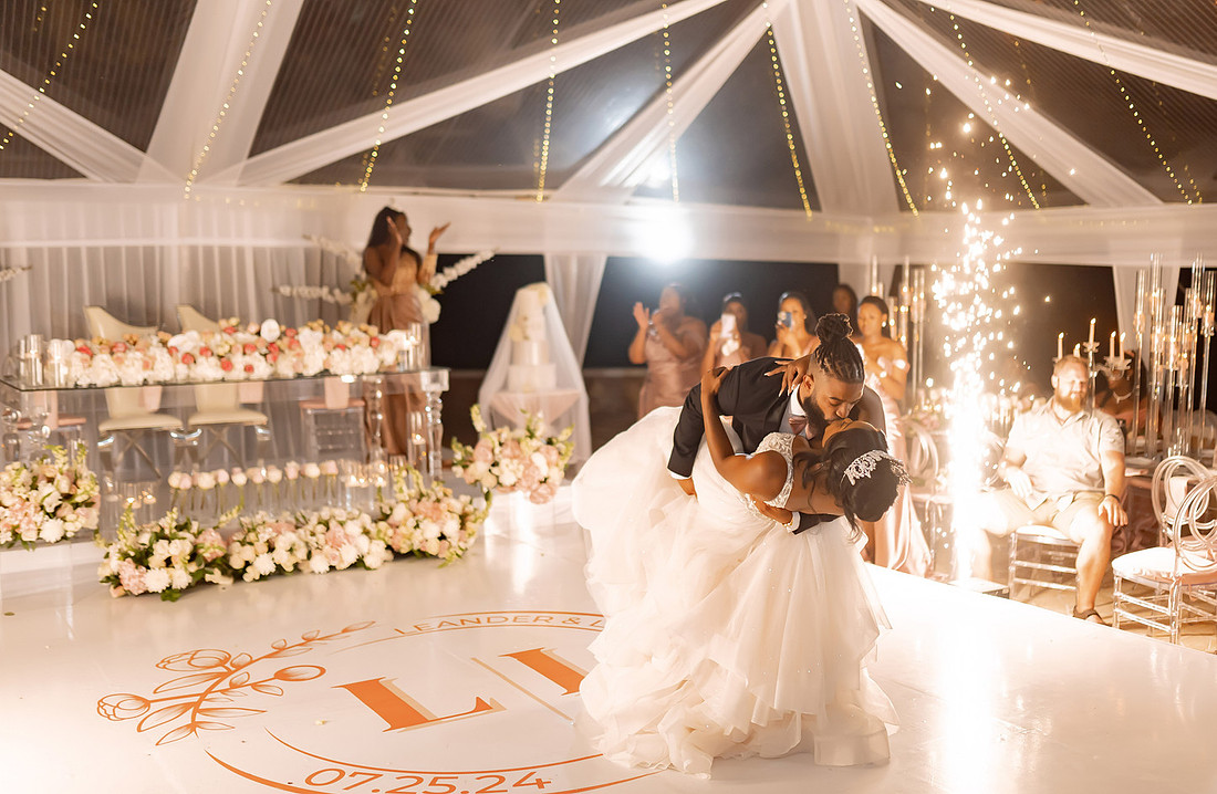 couple kissing on dance floor